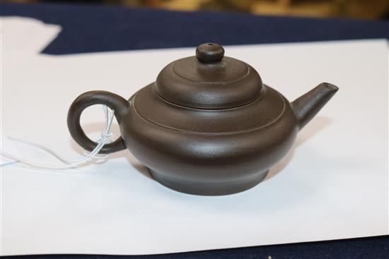 A 19th century Chinese Yixing teapot and cover